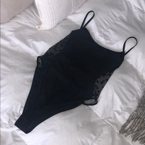 Brand new never worn black one piece/ White fox